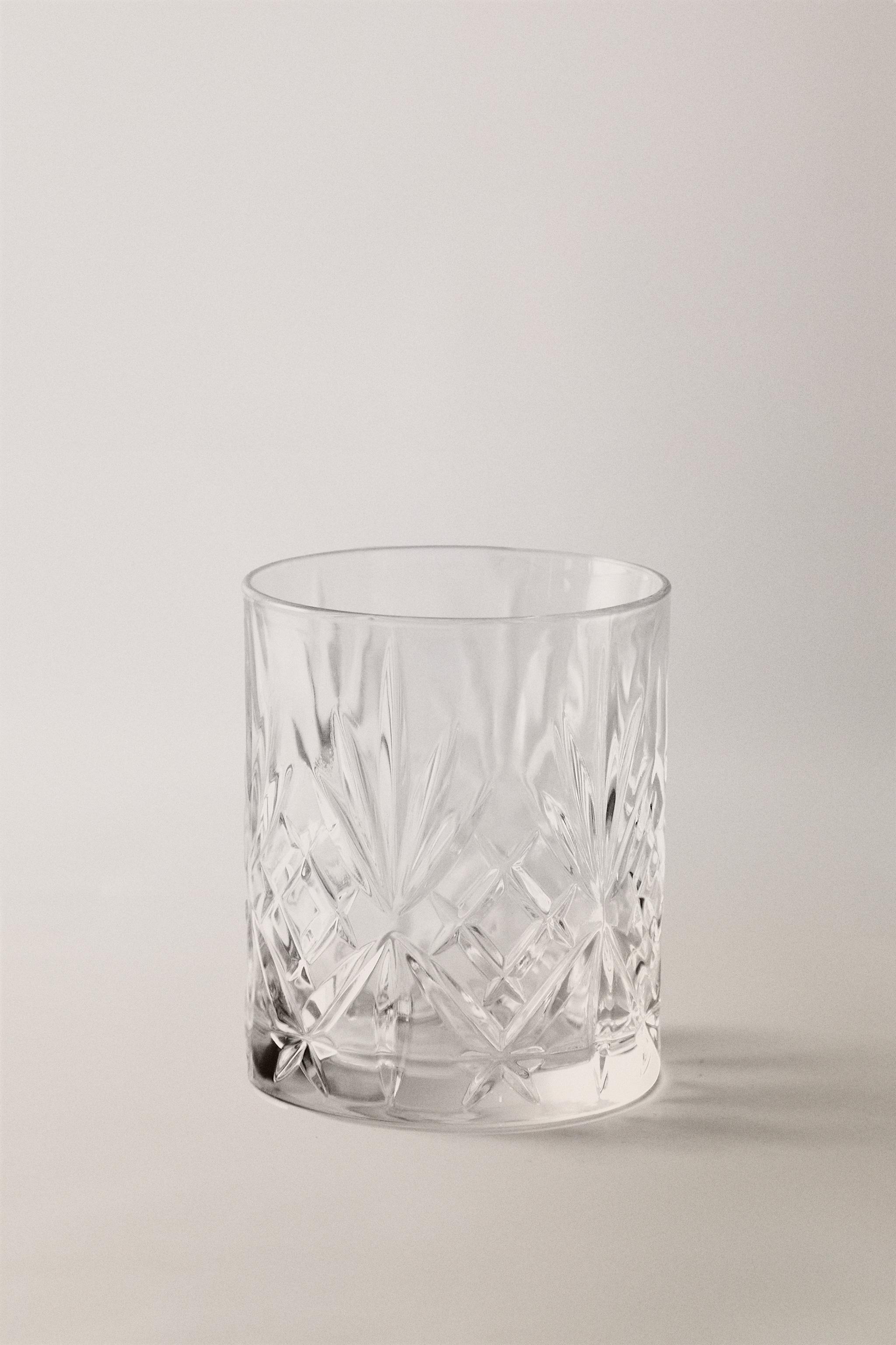 CRYSTALLINE TUMBLER WITH RAISED DESIGN
